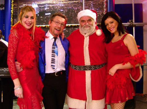 Una foto per gli auguri di BUON NATALE col babbo più famoso....